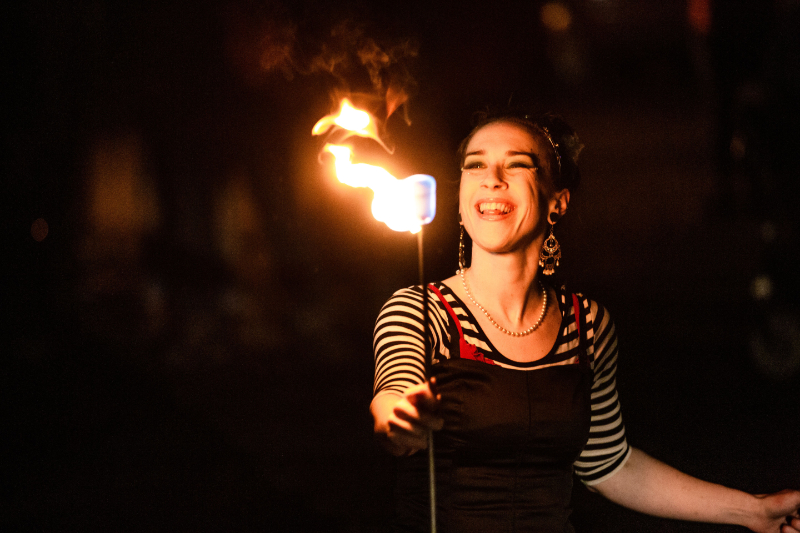Susan holding a fire baton